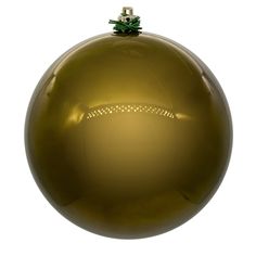 a shiny gold ball ornament on a white background