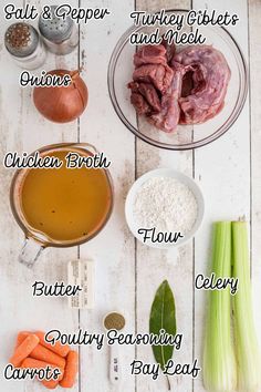 the ingredients to make chicken broth on a white wooden table with carrots and celery