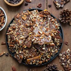 a plate full of chocolate and nuts on a table