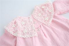 Lace Embroidery Baby Dress Pink Product Name: Lace Embroidery Baby Dress PinkDresses Length: Above Knee, MiniMaterial: COTTONDecoration: EmbroideryMaterial Composition: cottonFit: Fits true to size, take your normal sizeDress Style: A-line Silhouette: A-LineCollar: O collarSleeve Length(cm): FullSleeve Style: Lantern SleeveColor: pink, whiteAge: 0-2T Shipping: Please, allow between 10-25 business days for your order to arrive. Thank you for shopping with us! Summer Embroidered Dress With Doll Collar, Embroidered Cotton Dress With Doll Collar, Cotton Embroidered Dress With Doll Collar, White Doll Collar Dress With Floral Embroidery, Spring Dresses With Embroidered Peter Pan Collar, White Floral Embroidery Dress With Doll Collar, Spring Dresses With Peter Pan Collar And Embroidery, Embroidered Cotton Dress With Peter Pan Collar, Pink Cotton Dress With Lace Collar