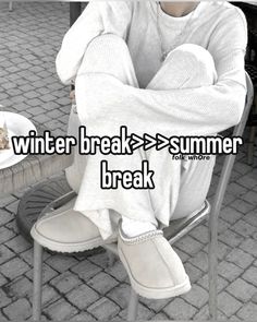 a person sitting in a chair with their legs crossed and the words winter break = > summer break