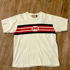 Gucci Logo Stripe T Shirt Size Medium New With Tags Gucci T-shirt For Summer Streetwear, Casual White Gucci Shirt, Gucci Classic Short Sleeve Top, Classic Gucci Short Sleeve Top, Gucci Short Sleeve Summer Shirt, Gucci Short Sleeve Shirt For Summer, Gucci Casual Summer Shirt, Casual Gucci Summer Shirt, Casual Gucci Shirt For Summer