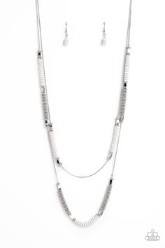 Featuring a layered display, two elongated silver snake chains dance down the neckline. Sections of shiny silver flower beads, capped by high sheen silver accents, are interspersed with stacks of white and silver studded beads, creating a bubbly, fanciful finish in rich neutral shades. Features an adjustable clasp closure. Sold as one individual necklace. Includes one pair of matching earrings. Bling Necklace, Neutral Shades, Silver Snake Chain, Flower Beads, White Necklace, Paparazzi Jewelry, Silver Accents, Shiny Silver, Silver Flowers