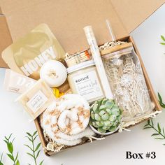 Celebrate the special occasion of a loved one's birthday with our Birthday Gift Box, curated to bring joy and happiness on their big day! Filled with handpicked items to make them feel cherished and appreciated, this box is sure to make their birthday memorable. A unique gift that will make anyone feel happy and blessed! Box #1 - Comes with a 6oz candle, succulent, floral mug, shea butter hand lotion, large hardcover notebook, and a bar of chocolate Box #2 - Comes with a floral mug, large hardcover notebook, shea butter hand lotion, herbal tea (1 only), mini jar of honey, crispy orange slices, and a bar of chocolate Box #3 - Comes with a 6oz candle, shea butter hand lotion, floral libby glass cup, nourishing sheet mask, pack of matches, succulent, pair of leopard socks, bath bomb, bath sal Candle Succulent, Leopard Socks, 6oz Candle, Self Care Basket, Self Care Package, Care Basket, Mask Pack, Care Box, Mini Jars