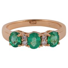 New Inspired Magnificent Emerald 3-Stone Ring 18 Karat Gold The 3 Fine emeralds show excellent clarity, and excellent color, weighing Emerald 0.94 carats total, Diamonds 0.08 Carat & Gold 3.29 gm. The yellow gold Half band and setting add warmth and shine to the piece., gorgeous! The ring is a size 6.5 US Can be resizable & come along with Box. Indian Romantic, Elegant Yellow Gold Multi-stone Emerald Ring, Luxury Vintage Multi-stone Emerald Ring, Fine Jewelry Multi-stone Turquoise Ring In Yellow Gold, Vintage Multi-stone Emerald Ring In 14k Gold, 14k Gold Green Emerald Ring, Fine Jewelry, 3 Stone Rings, Diamond Ring Settings, Jewelry Rings Engagement