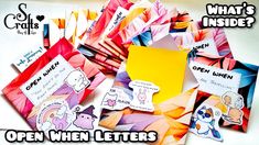 an assortment of open when letters are cut out and placed on top of each other with the words what's inside?