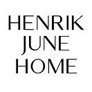 the logo for hennik junee home, which is located in front of a white background