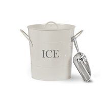 an ice bucket and tongs are sitting next to each other