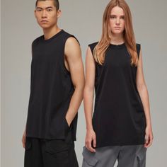 New With Tags Size Medium Unisex Color Black Style Code Hy1255 Elevate Your Casual Look With This Y-3 Yohji Yamamoto Black Tank Top. The Sleeveless Tunic Is Designed With A Crew Neck And A Pullover Closure, Making It A Comfortable Fit For Everyday Wear. The Solid Pattern And Polyester-Cotton Material Give Off A Sleek And Stylish Appearance That Makes It Perfect For Any Occasion. This Unisex Tank Top Is Machine Washable, Making It Easy To Maintain Its Quality. The Size Is Regular And Fits A Mediu Y 3 Yohji Yamamoto, Online Shopping India, Black Tank Top, Sleeveless Tunic, Yohji Yamamoto, Black Style, Black Tank, Sweatshirt Dress, Black Adidas