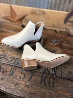 Boutique Vanish Bootie in Ivory You won't vanish from the scene in these Boutique Vanish Booties in Ivory! Perfect for any occasion - whether you're living it up at a party or dressing up for the office - these cute booties will ensure all eyes are on you! Shop the rest of our Corky Booties here! Details 1" Heeled Bootie Zipper on heel Sizing Women's 6, 7, 8 ,9, and 10 Shipping - If you’re local, you can stop in and shop at our Carthage, MO! All online orders typically ship within 1 - 2 business Anderson Bean Boots, Denim Top Women, Lane Boots, Felt Cowboy Hats, Straw Cowboy Hat, Rope Bag, At A Party, Carthage, Bean Boots