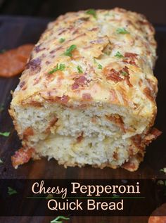 cheesy pepperoni quick bread on a cutting board