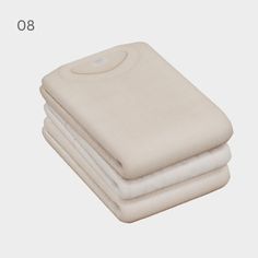 three white blankets stacked on top of each other in front of a gray background with the number 80