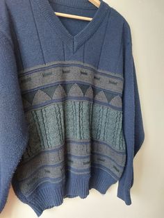 Vintage Peruvian Wool Sweater, Handmade Knitwear, Unisex Jumper, Wool 80s Pullover, Vintage Sweaters, Grandpa Sweater Archive Clothes Size M 100% Acrylic Color navy blue olive green there is no size tag, it looks like XL but  see measurements  All measurements taken with garment laid flat: Chest 68cm / 26,77 in Lenght 70cm / 27,55 in Shoulders 51cm / 20,07 in Sleeve lenght 62cm / 24,40 in Condition used good Casual V-neck Fair Isle Sweater, Vintage Long Sleeve V-neck Sweater For Winter, Retro Long Sleeve Knitted Sweater, Cotton Jacquard Knit V-neck Sweater, Vintage Knitted Cotton Sweater, Vintage Cotton Knitted Sweater, Retro Knitted Sweater For Cold Weather, Retro Textured Knit Long Sleeve Sweater, Retro Textured Knit Winter Sweater