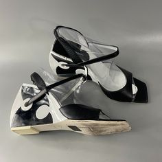 Charles Jourdan White/Black Floating Puzzle Heels Shoes Iconic Estate Size 8.5 Made In Italy Open Toes Heeled Sandals Slingback (Being Tailored) Adjustable Wrap-Around Strap, Buckle Closure Heel Height: Approx. 4'' Inner Sole Length Measures From Toe To Heel Approx. 9.75'', Widest Width Approx. 3.25'' They Are In Good Vintage Pre-Owned Condition With Wear, Minor Scuff, And Smudges Neither New Nor In Mint Condition Please See The Posted Pictures For Detail Ask Any Questions Before Purchasing. Charles Jourdan, Heels Shoes, Heeled Sandals, Mint Condition, Shoes Women Heels, Open Toe, Sandals Heels, White Black, Heel Height