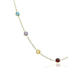 14K gold station necklace with round gemstones by the yard. This handmade gemstone necklace takes the classic By The Yard design and gives it a colorful update. Genuine gemstones are hand set into 14K yellow gold bezels and are connected by a 14K yellow gold cable chain. Classic Gold Multi-stone Necklace, Classic Round Multi-stone Necklaces, Elegant Gold Multi-stone Birthstone Necklace, 14k Yellow Gold Necklace, Ankle Chain, Yard Design, Station Necklace, Citrine Gemstone, Handmade Necklace