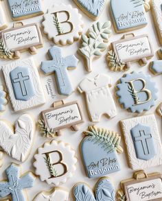 decorated cookies are arranged on a table