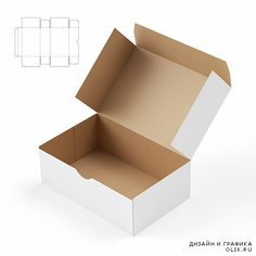 an open cardboard box with cut outs on the side and inside, sitting on a white surface