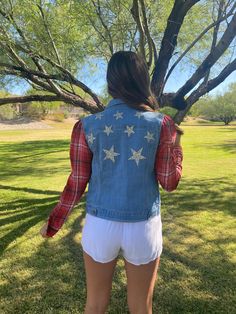 Reworked Denim Jacket with flannel sleeves & Rhinestone Stars.   Small Fall Denim Jacket With Star Print, Fall Denim Jacket With Star Patch, Reworked Tshirt, Reworked Denim Jacket, Reworked Clothing, Reworked Denim, Reworked Vintage, Womens Jackets, Vintage Denim Jacket