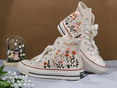 " Custom Embroidered Wedding Converse, White Flowers Embroidered Sneakers for Bride, Embroidered Wedding Reception Shoes, Wedding Gifts LP"   CONVERSE ∙ EMBROIDERED ∙ WEDDING SHOES * Material: High-quality premium cotton embroidery thread, colorfast * Dimensions: Tailored to your selected US shoe size * Finish: High-end embroidery ∙ Sharp threading ∙ Colorfast * All shoes are custom-made by hand with Love and Care in our workshop ♡ 🎁 UNIQUE POINTS 🎁 Includes 1 pair of socks Free custom name or Mexican Wedding Shoes, Embroidered Converse Wedding, White Embroidered Closed Toe Wedding Shoes, Embroidered Round Toe Wedding Shoes, Spring Wedding Sneakers With Round Toe, Spring Wedding Embroidered Sneakers, Wedding Low-top Sneakers With Floral Embroidery, White Wedding Sneakers With Custom Embroidery, White Wedding Sneakers For Summer