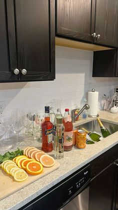 the kitchen counter is covered with various ingredients