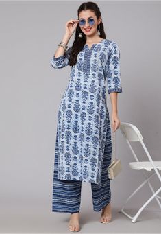 Readymade Pure Cotton Straight Kurta in Blue This Notched Round Neck and Quarter Sleeves attire is Enhanced with Floral Print Available with a Pure Cotton Palazzo in Blue Do Note: Accessories shown in the image are for presentation purposes only and length may vary upto 2 inches.(Slight variation in actual color vs. image is possible). Straight Kurti Designs, Diwali Wear, Top Fabrics, Indian Suits For Women, Lucknowi Kurti, Motifs Embroidery, Elegant Prints, Kurta With Palazzo, Chikankari Kurti