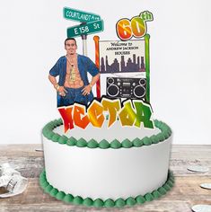 a birthday cake with the name kerry on it and an image of a man standing in front of a street sign