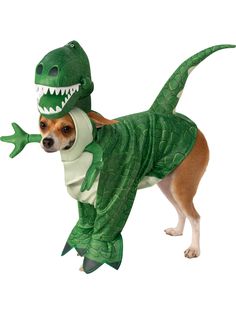 a dog in a costume that is wearing a green alligator suit and has it's mouth open