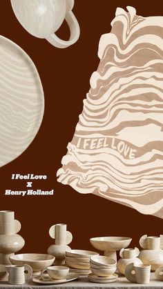 there are many white cups and saucers on the table with words that read i feel love & harry holland