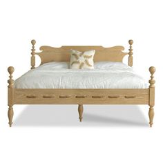 a wooden bed frame with white sheets and pillows on top of it, against a white background