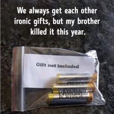 there are three batteries in the bag on the table next to each other and one is labeled gift not included