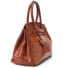 Extraordinary, exclusive creations, meticulously handcrafted by an Austrian-born master craftsman in South Africa. Made from genuine crocodile skin sourced through Hermes Cuir Précieux, the epitome of elegance and prestige Original Retail Price: $12,000 Large Hermes Birkin 35-style bag. Pre-owned Cognac Color Genuine Nile Crocodile Skin ( Hermes cuir precieux) Tote with side straps and turn-lock hanging key fob croc skin-wrapped padlock with a set of keys two rounded top handles internal zip poc Luxury Brown Crocodile Pattern Bag, Luxury Brown Crocodile Pattern Shoulder Bag, Luxury Brown Shoulder Bag With Crocodile Pattern, Designer Brown Bag With Crocodile Pattern, Luxury Italian Brown Shoulder Bag, Designer Brown Crocodile Pattern Shoulder Bag, Designer Brown Shoulder Bag With Crocodile Pattern, Cognac Leather Bag With Crocodile Pattern, Leather Bags With Crocodile Pattern In Cognac