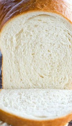 a loaf of white bread sitting on top of a table