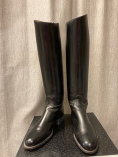 "These superb quality riding boots are made by Dehner's of Omaha. Dehner was established in Kansas in 1875, originally making custom made boots for the cavalry. Today in Omaha they make the highest quality Polo and riding boots as well as biker and law enforcement boots. They also make custom shoes and boots. These boots were custom made as there is a name, Mrs D Knight, printed on the inside. There is no shoe size marked but I think they are size 8. The outer sole is 29cm from heel to tip of to Classic Riding Knee-high Boots, Classic Knee-high Riding Boots, Historical Formal Boots With Leather Sole, Classic Black Knee-high Riding Boots, Classic Snip Toe Knee-high Boots For Winter, Classic Knee-high Boots With Leather Sole For Riding, Classic Fitted Riding Boots, Classic Round Toe Knee-high Riding Boots, Western Moto Boots For Riding With Leather Lining