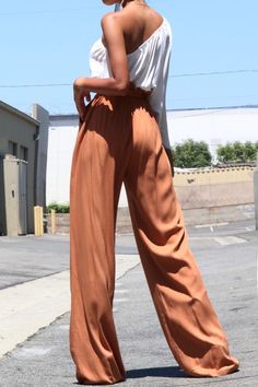 Woven jumpsuit featuring a solid one-sleeved top and a wide-legged, palazzo style bottom with front pockets and a belted waistline. Palazzo Style, Jumpsuit With Pockets, Womens Jumpsuits, Girls Night Out, Shoulder Sleeve, Girls Night, Modern Woman, Jumpsuits For Women, Final Sale