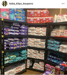 the shelves are full of toilet paper and other items for sale in a grocery store