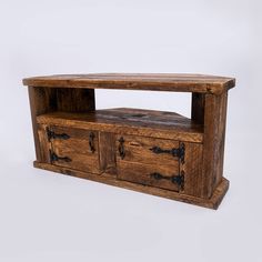 an old wooden entertainment center with drawers