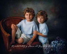 two young boys sitting on top of a chair in front of a bouquet of flowers