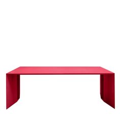 a red table on a white background with no one around it or someone else to the side