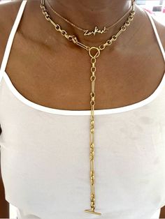 Super trendy luxurious necklace to wear. This necklace is guaranteed to be your favorite piece and will make a perfect gift to a loved one

#longchain #lariatnecklace #longjewelry #giftforher #luxurynecklace #luxuryjewelry #namenecklace #customnecklace Trendy Lariat Jewelry With Adjustable Chain, Lariat Chain Jewelry As A Gift, Lariat Chain Jewelry Gift, Gift Lariat Chain Jewelry, Trendy Adjustable Lariat Chain Necklace, Lariat Choker With Clavicle Chain, Metal Lariat Necklace With Clavicle Chain, Lariat Clavicle Chain Choker, Clavicle Chain Lariat Choker