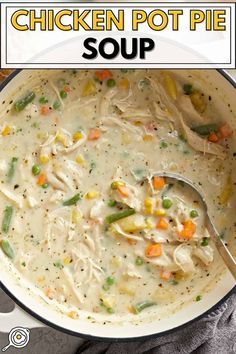 chicken pot pie soup in a white bowl with a spoon