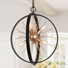 Incorporate a chic modern accent into your living space with this uniquely 6-Light Black and Gold in Globe Frame Sputnik Modern/Contemporary Cage Chandelier by Uofin Lighting, safely rated for dry locations. The globe frame and Sputnik candle-style light base are eye-catching designs of this black dining room chandelier, whose intricate design is chic but comes pre-installed and is very easy to install. The light passes through the hollow frame of this modern bedroom chandelier lighting, which w Starburst Chandelier, Modern Farmhouse Chandelier, Orb Chandelier, Cage Chandelier, Chandelier Black, Dining Room Pendant, Round Dining Room, Modern Pendant Lamps, Pendant Lighting Dining Room