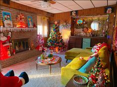 a living room decorated for christmas with decorations