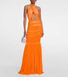 Shirred halterneck gown in orange - Norma Kamali | Mytheresa Ruched Draped Halter Dress For Evening, Ruched Halter Neck Maxi Dress For Gala, Fitted Ruched Halter Maxi Dress, Fitted Ruched Halter Dress For Gala, Sleeveless Ruched Halter Dress For Gala, Fitted Draped Ruched Halter Dress, Halter Neck Evening Dress With Ruched Bodice, Orange Halter Neck Maxi Dress For Evening, Fitted Halter Neck Evening Dress With Ruched Bodice