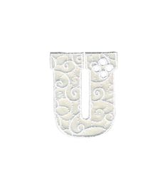 the letter u is made up of white fabric and has swirly designs on it