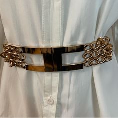 Beige Pu Leather Gold Tone Buckle Chained Elastic Waistband Belt Material: 50% Polyurethane, 50% Elastic Please Notice: White Shirt Is Not Included, Listing Is For The Belt Only. Warning: P65 (See Last Picture) All Measurements Are Approximate And Taken Laying Flat: Length: 29 1/2 Inches Height: 2 Inches Tags For Exposure: Chain Belt Chained Belt Western Boho Bohemian Western Wide Wide Belt Location: Tote: #2 Trendy Adjustable Gold Belt, Chic Adjustable Gold Chain Belt, Chic Evening Chain Belt With Adjustable Chain, Chic Adjustable Chain Belt For Evening, Chic Adjustable Chain Evening Belt, Adjustable Metal Party Belt, Chic Adjustable Chain Belt As Fashion Accessory, Trendy Chain Print Belt, Elegant Adjustable Chain Link Belt