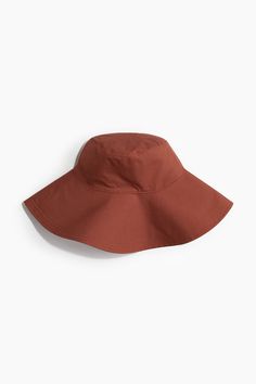 Sun hat in cotton poplin with a wide brim. Lined. Width of brim 4 3/4 in. Solid Cotton Sun Hat With Flat Brim, Solid Color Cotton Sun Hat With Flat Brim, Cotton Fedora Hat, Cotton Wide Brim Sun Hat With Upf 50+, Cotton Sun Hat With Upf 50+ And Wide Brim, Wide Brim Sun Hat, Wide Brimmed, Sun Hat, Cotton Poplin