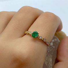 EMERALD GEM RING - Dainty Emerald Ring - Gemstone Wedding Ring Vintage - Yellow Gold Jewelry - Natural Emerald Ring - Wedding Ring Gift *100% naturel gemstone *14k solid gold *solid gold (NOT plated) *gemstone: emerald *gemstone: zircon *stone shape emerald: oval *stone shape zircon: round *stone emerald : 3x5 mm. *stone emerald ct. : 0.60-0.85 ct. *stones emerald : 1 pc. *stone zircon : 6 pcs. Wedding Emerald Ring With Diamond Accent Stones, Moissanite Emerald Ring For Wedding, Exquisite Emerald Promise Ring, Heirloom Emerald Ring With Bezel Setting For Wedding, Cubic Zirconia Emerald Ring With Accent Stones For Wedding, Emerald Bezel Setting Ring For Wedding, Wedding Emerald Ring With Cubic Zirconia Accent Stones, Emerald Round Cut Wedding Ring, Green Moissanite Emerald Ring For Wedding