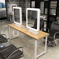 two chairs and a table with mirrors on it