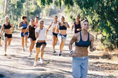 a group of people running down a dirt road with the words to know that anything you can do is better