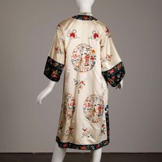 For Sale on 1stDibs - Stunning and pristine 20th C. Chinese silk satin robe with colorful embroidery of figures and cherry blossoms. Fully lined in silk with front frog button Silk Kimono With Floral Embroidery, Spring Silk Kimono With Floral Embroidery, Spring Silk Kimono With Embroidery, Spring Embroidered Silk Kimono, Embroidered Robes, Japanese Colors, Embroidered Coat, Chinese Silk, Colorful Embroidery